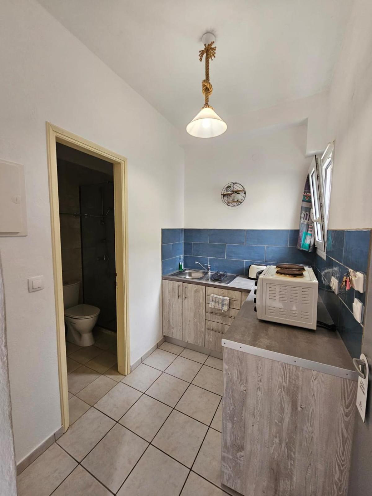 Gardelis Gardens Apartment Benitses  Ruang foto